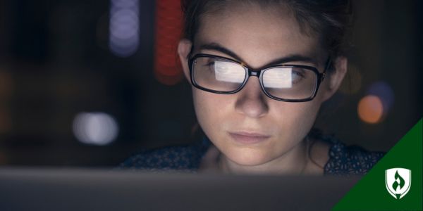 A cybersecurity analyst at their desk